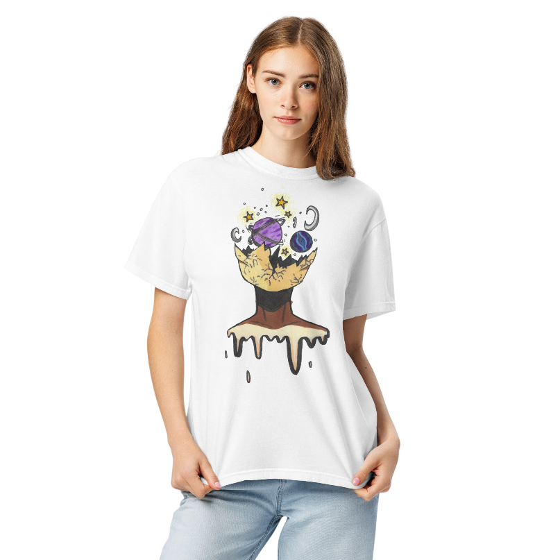 Person wearing a white t-shirt with a unique design on a plain background